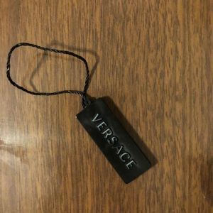 Plastic Versace tag